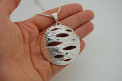 Large circle statement necklace: chunky silver pendant with sapphire accents - Fine Jewelry by Anastasia Savenko